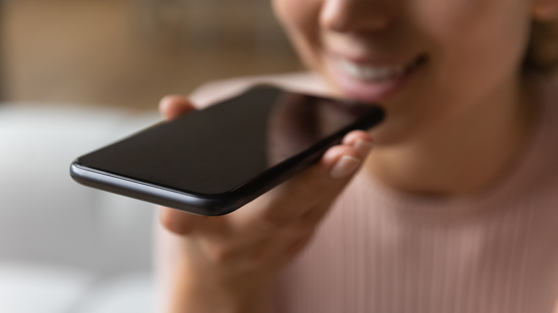 Woman speaking into cell phone